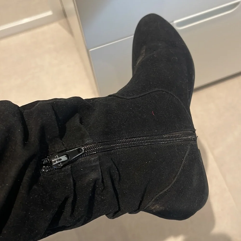 Women size 6 Black over the knee boots zipper on the inside soft suede alike